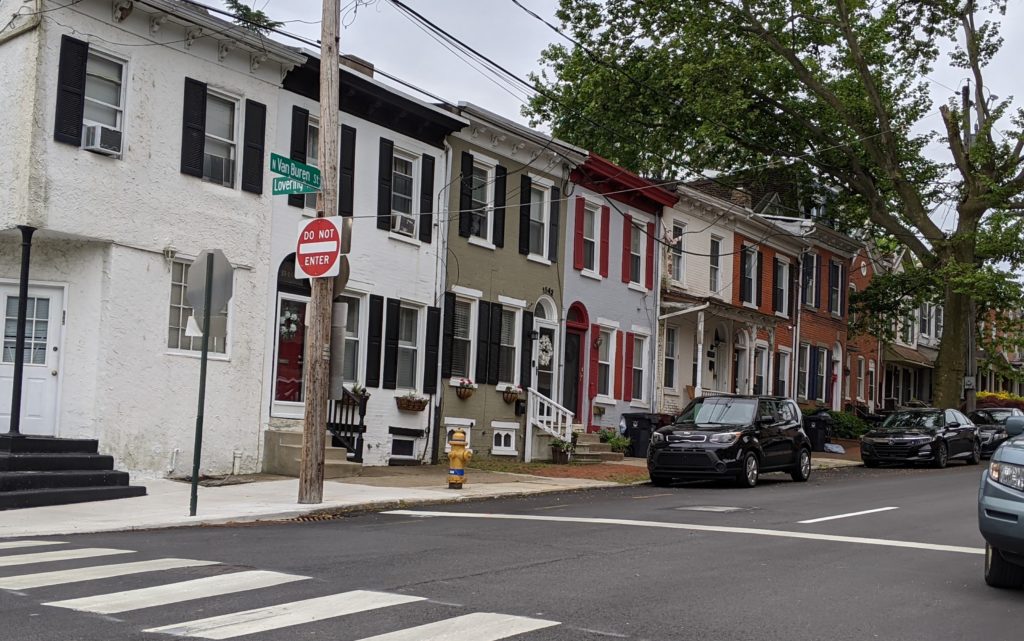 Two-story brick houses at the Intersection of Van Buren and Lovering Streets in Wilmington, Delaware.