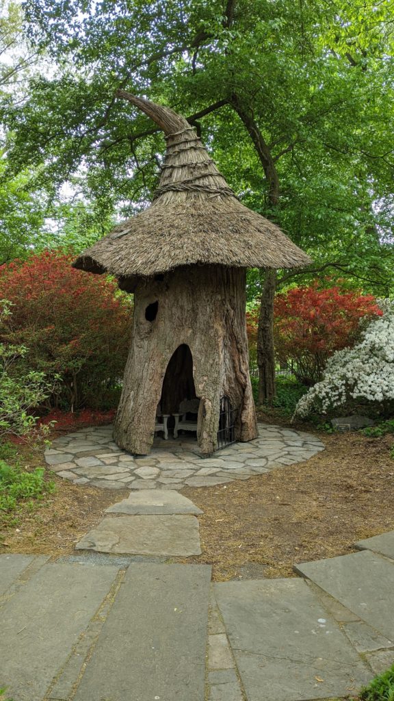 Thatch roof house "folly" in Winterthur's Enchanted Garden for children.