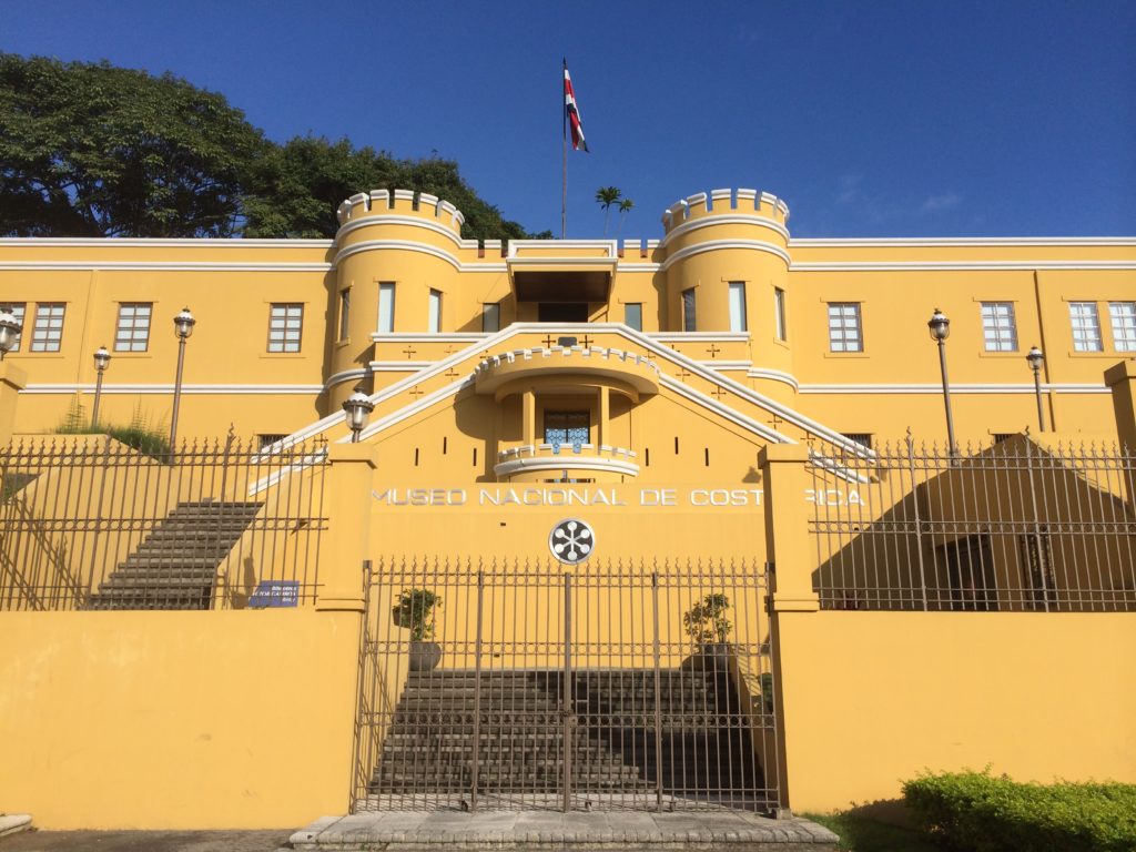 Exterior of bright yellow National Museum of Costa Rica in San Jose.
