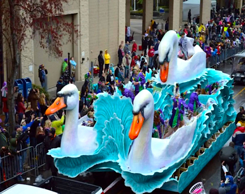 A colorful Swan Float in the Mardi Gras Parade of Mobile, Alabama. Photo c. Mobile Carnival Museum.
