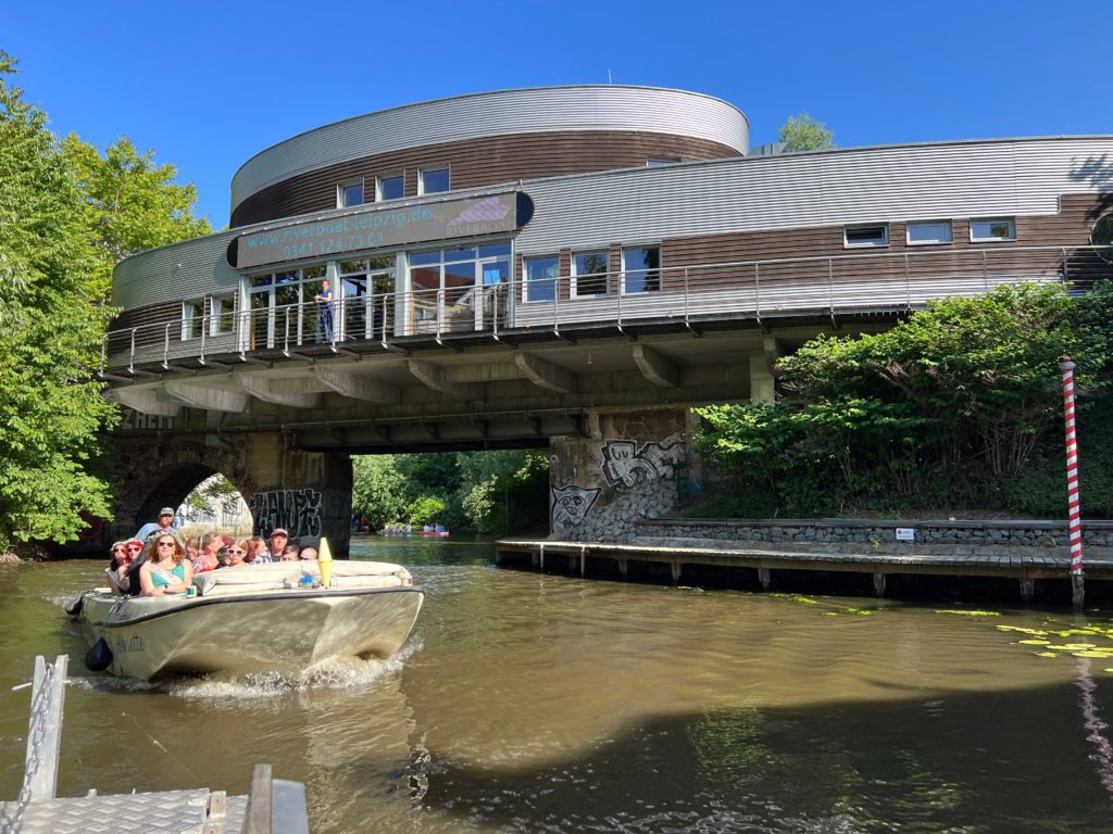 A group in Leipzing, Saxony aboard a river boat for a city harbor tour on the town's waterways.