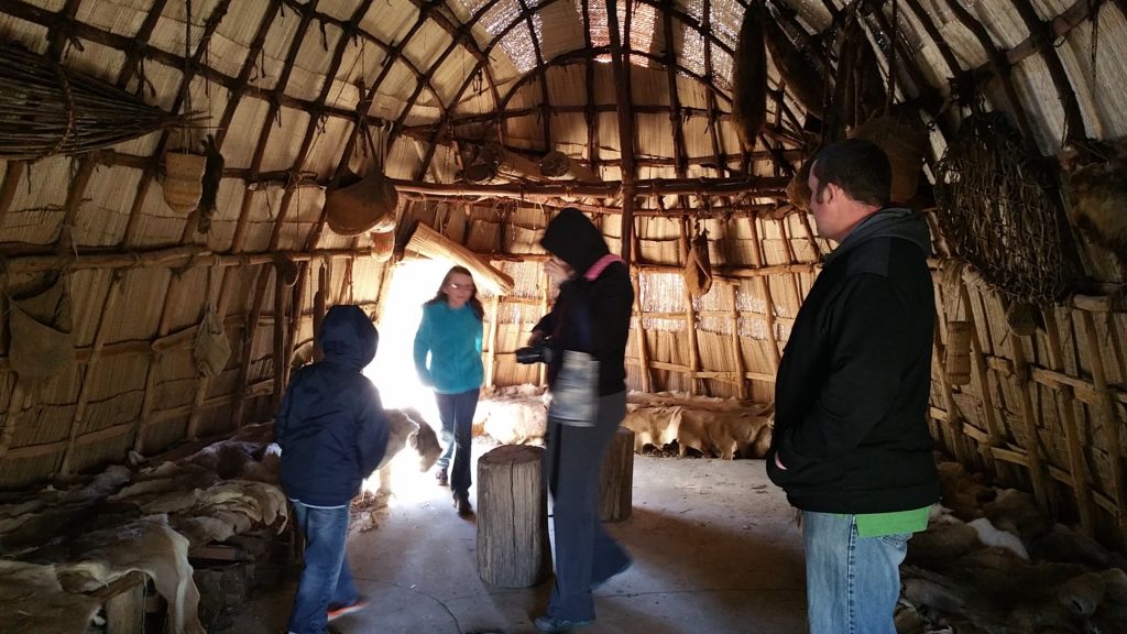A Powhatan village similar to where Pocahontas was raised is recreated at Jamestown Settlement.
