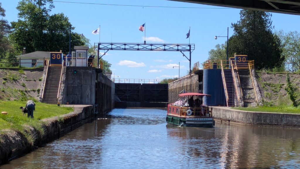 Canal barge approaches Lock 30 in Macedon Landing New York.