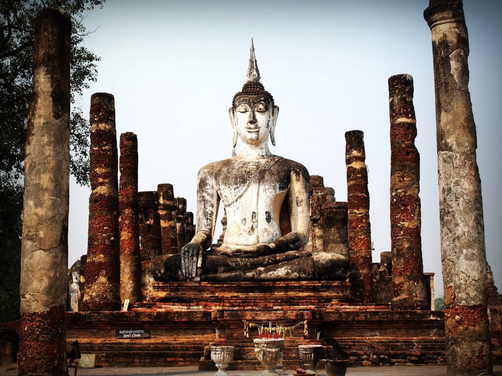 An ancient Buddha statue is honored on Buddha Purnima, his birthday celebration in Thailand. 