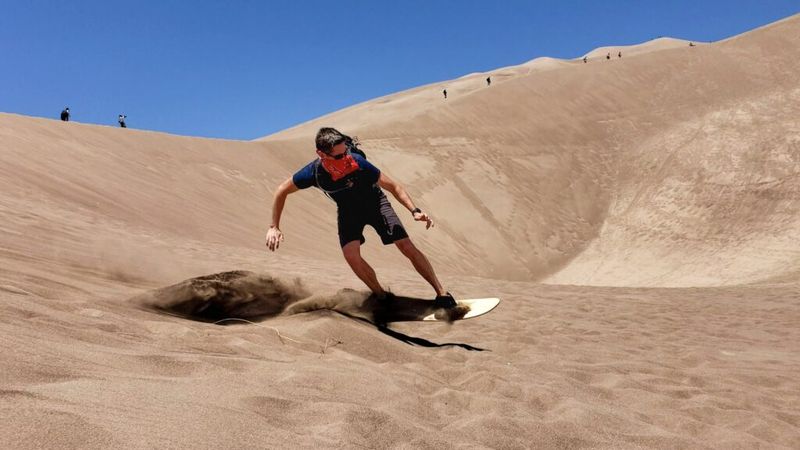 Sandboarding and Sand Sledding: Channel Your Inner Child (Or Daredevil)