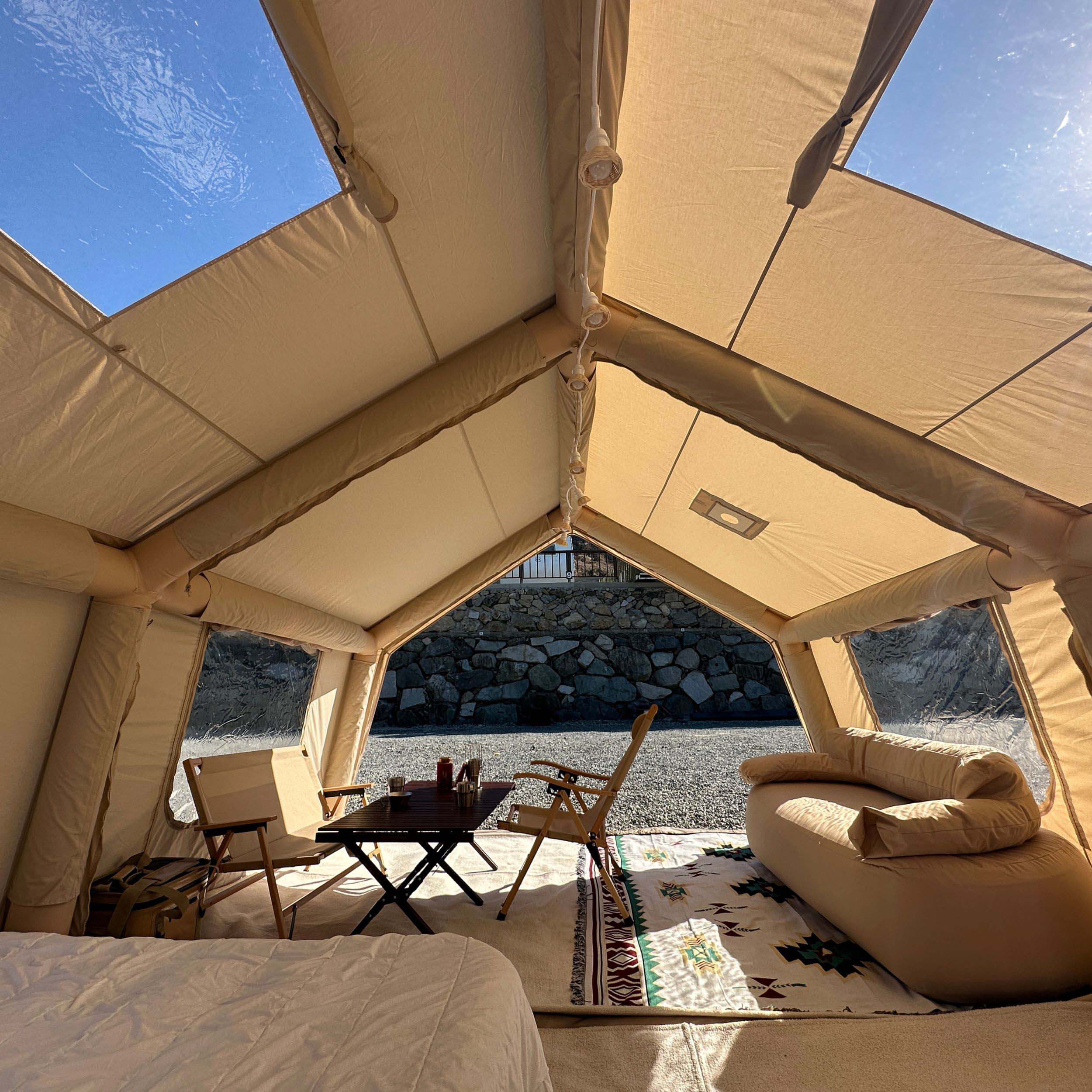 New, posh glamping tents are weatherproof and well furnished for outdoor living.