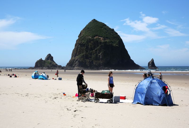 Cannon Beach: Haystack Rock Surrounded by Heavy Crowds