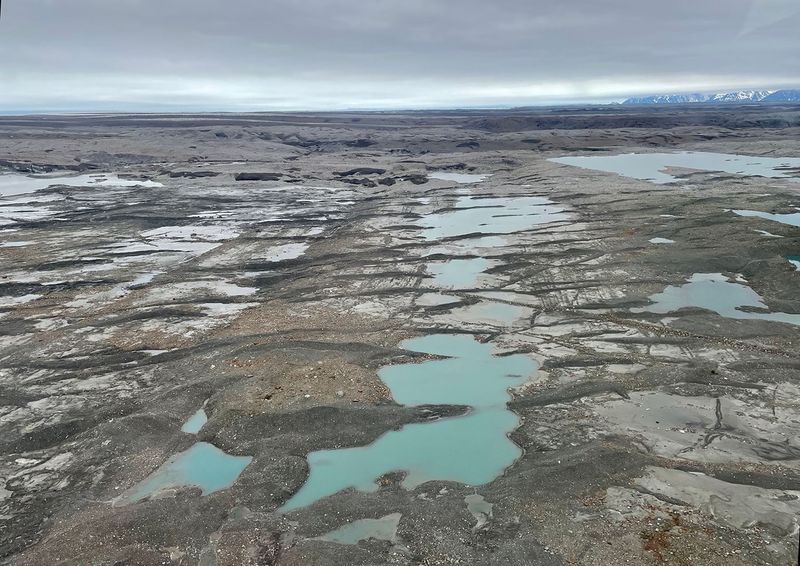 Newly Formed Glacial Lakes Dot The Landscape