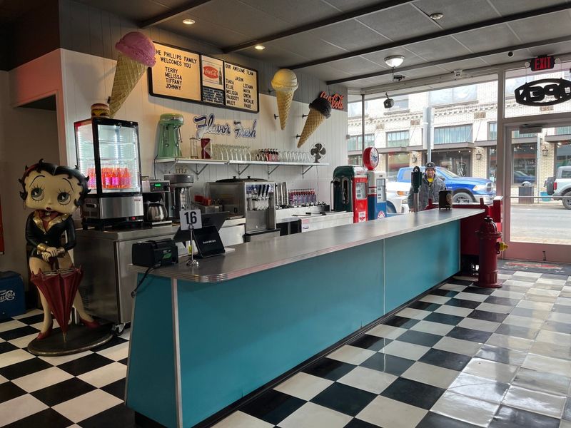 Cherry-Red Booths And Checkered Floors Transport You Back In Time