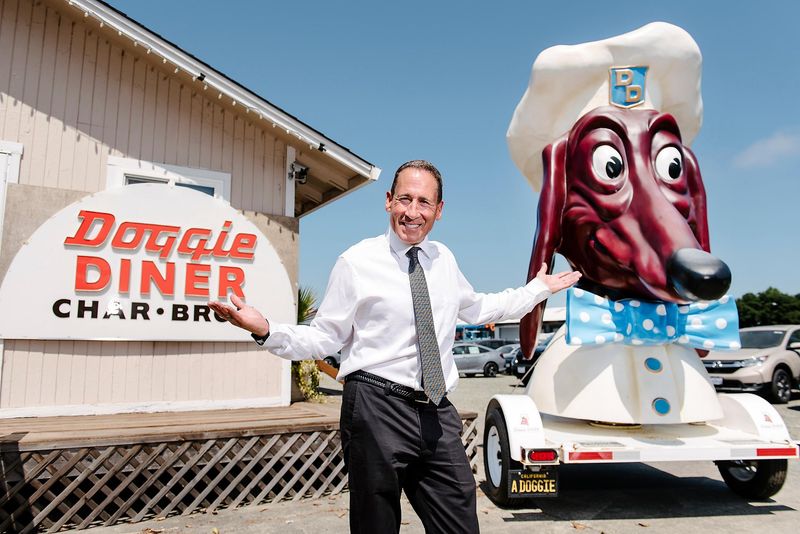 The Iconic Dog Heads: From Signage to Sculpture