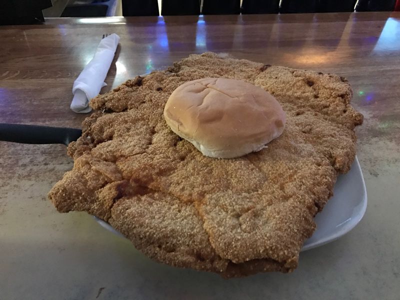 The Pork Tenderloin Is Giant And Hand-Breaded