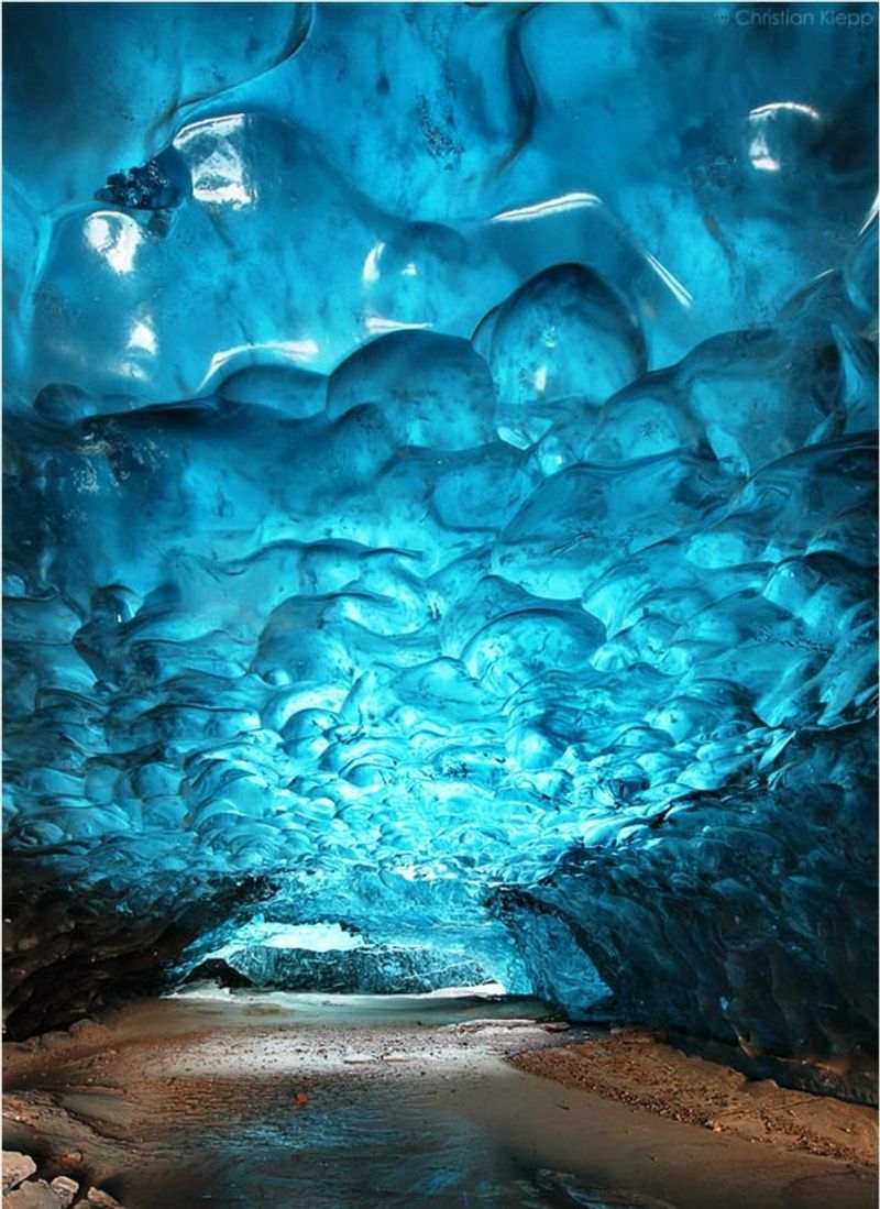 Glacial Ice Caves of Mendenhall Transform Into Sapphire Cathedrals