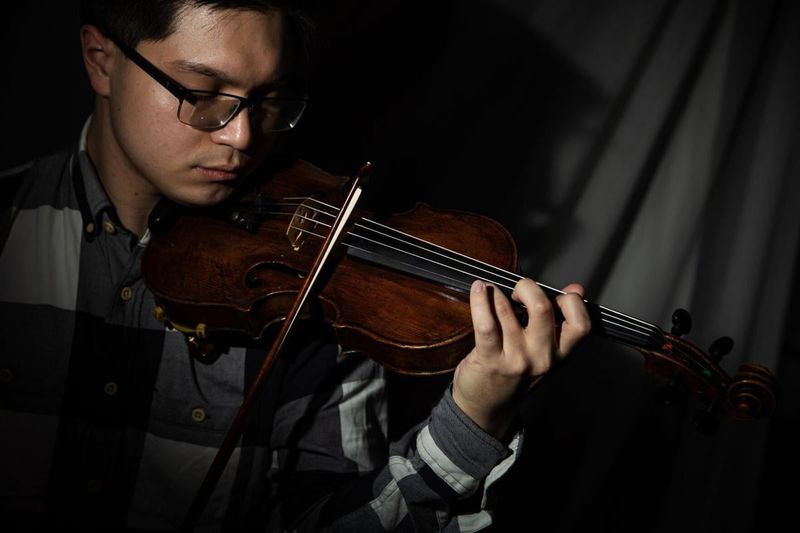 That quirky violin in a paper bag rumor