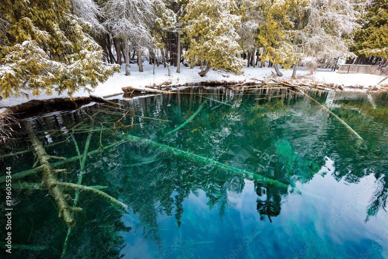 Kitch-iti-kipi: The Emerald Window in Winter's White