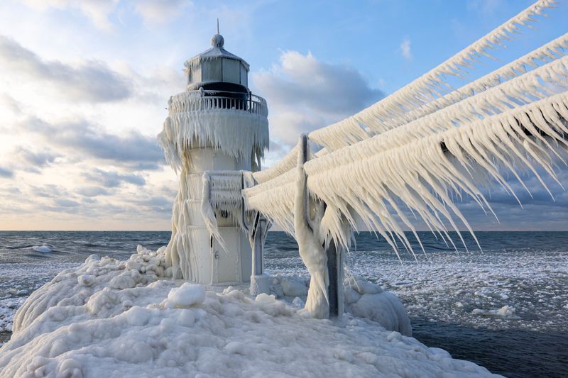 Frozen Lighthouses: Sentinel Sculptures of Ice