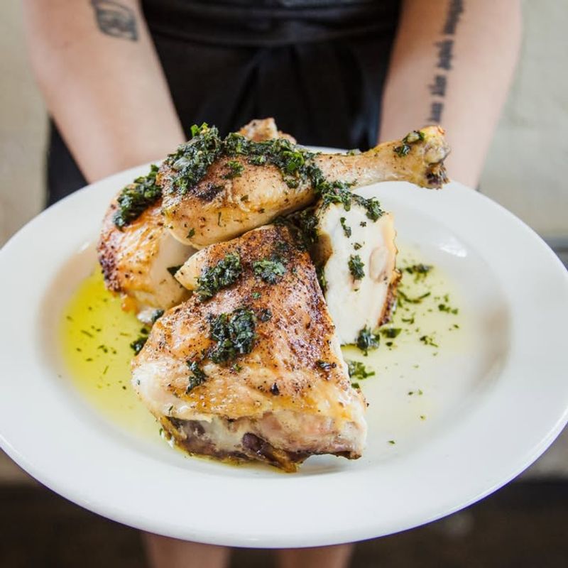 Roasted chicken, shrimp and grits, and seasonal sides