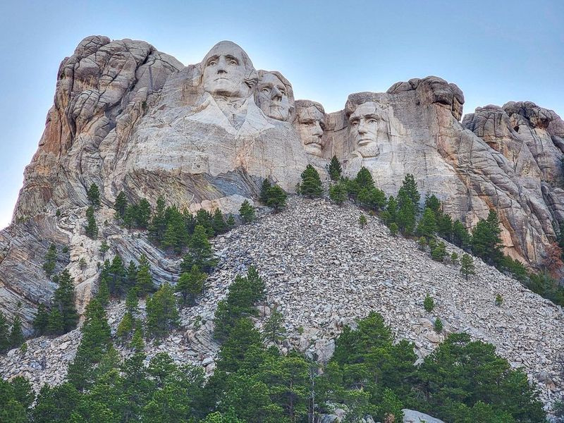 Climbing Historic Sculptures and Memorials in Town Centers