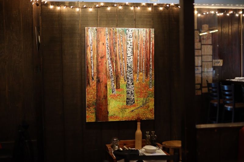 The Ambience: Warm, Rustic, Intimate