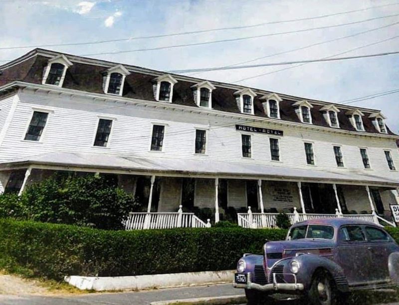 A Building Standing Between Land and Water