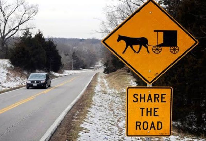 Driving Impatiently Behind Horse and Buggies