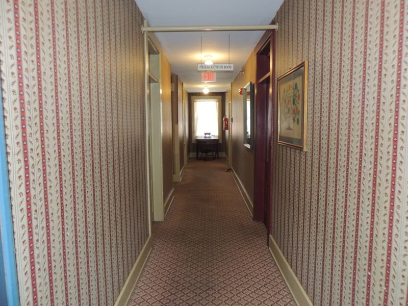 Hallways Filled With Portraits and Old Stories