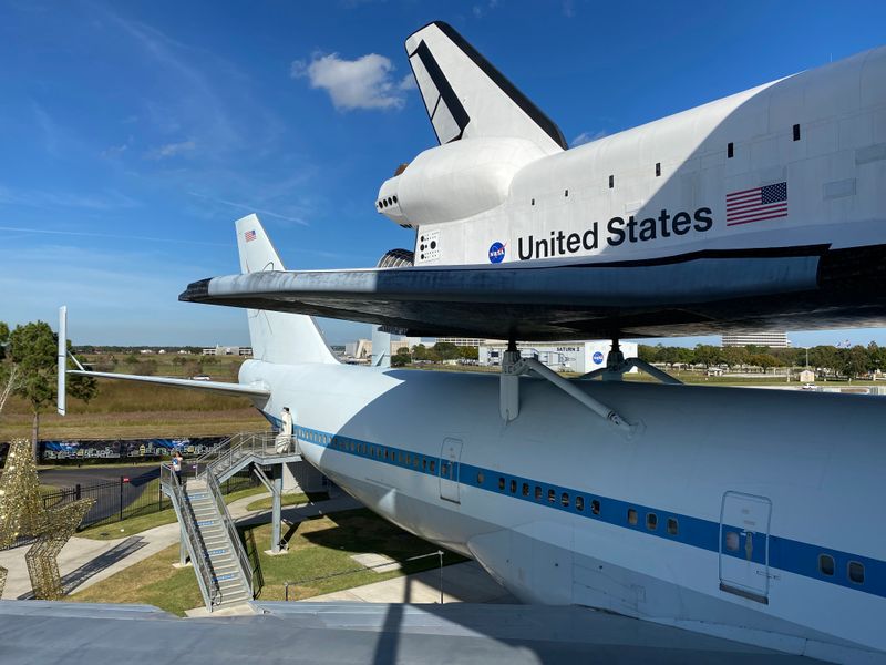 Climbing into the shuttle replica