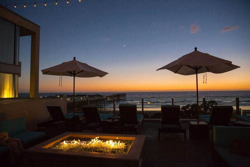 Rooftop Lounge and Fire Pits: Evenings Above the Surf