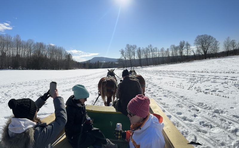 Evening Sleigh Ride Through Snowy Fields