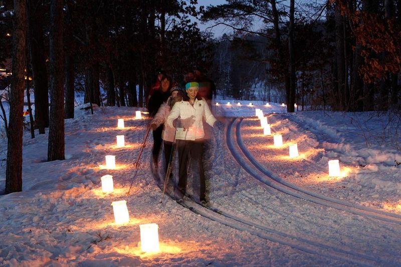 Candlelight Paths Through Snow