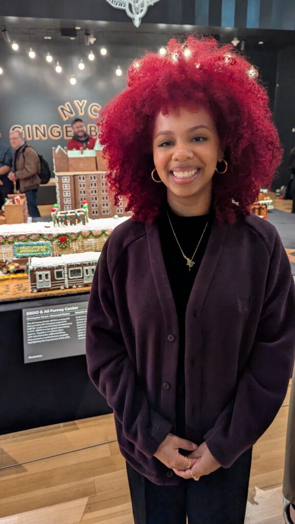 Baker Zahra Sabir with her "Christopher Street - Stonewall" exhibit at the Museum of the City of New York.