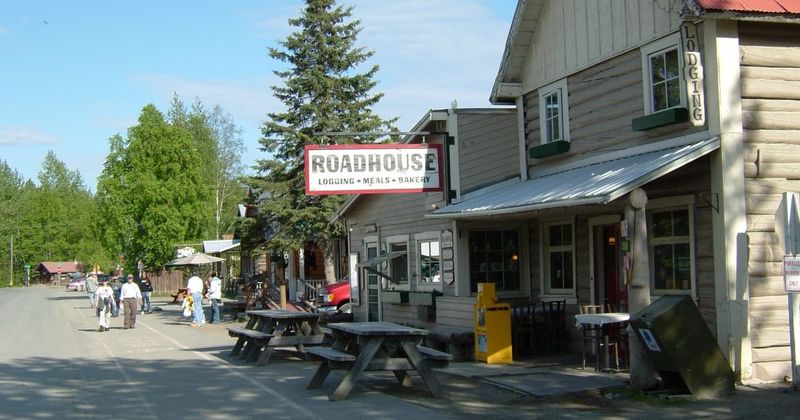 A Log Building With Real Frontier Roots