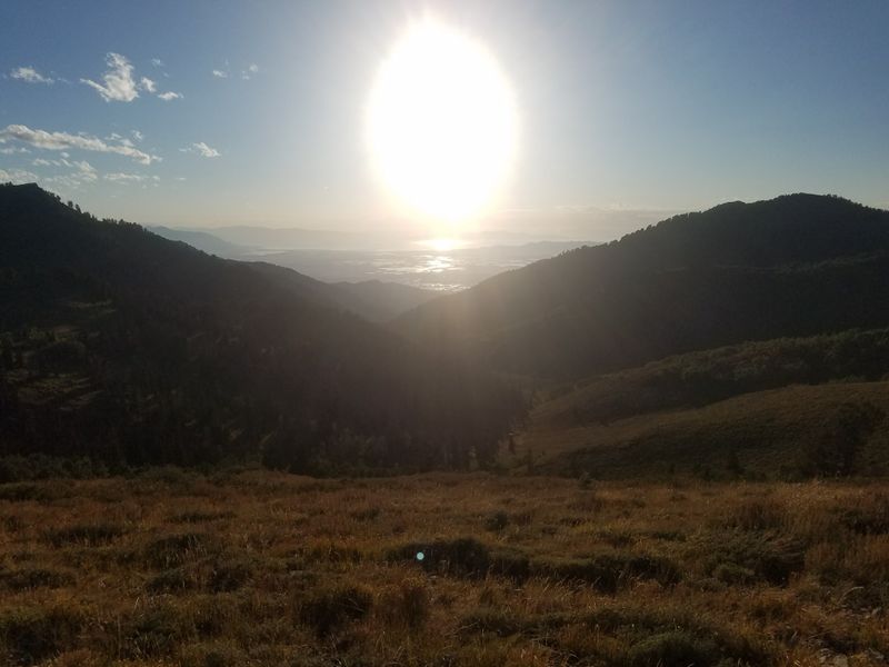 Scenic Drives Leading Into a Snow Filled Basin