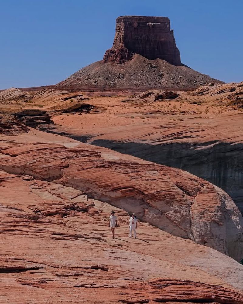 A Setting Marked by Towering Mesas and Open Space