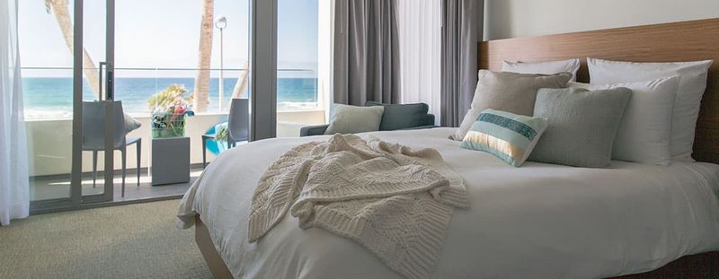 Design and Rooms: Glass, Light, and Private Balconies