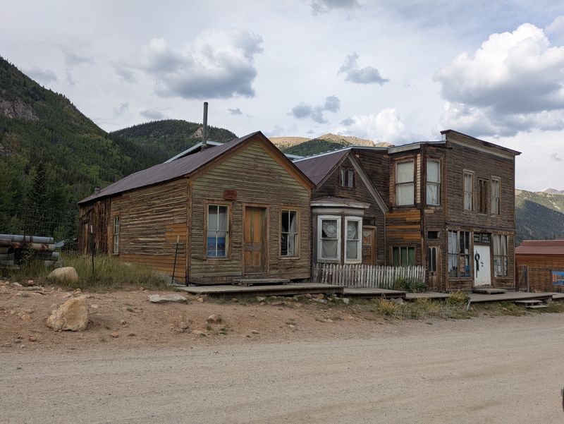 Main Street storefronts that frame a perfect mountain backdrop