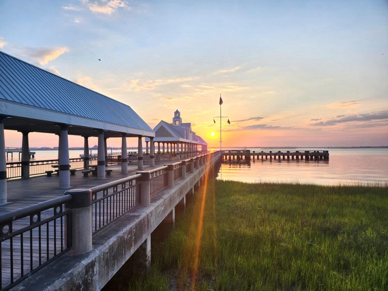 Sunset From A Harbor Pier