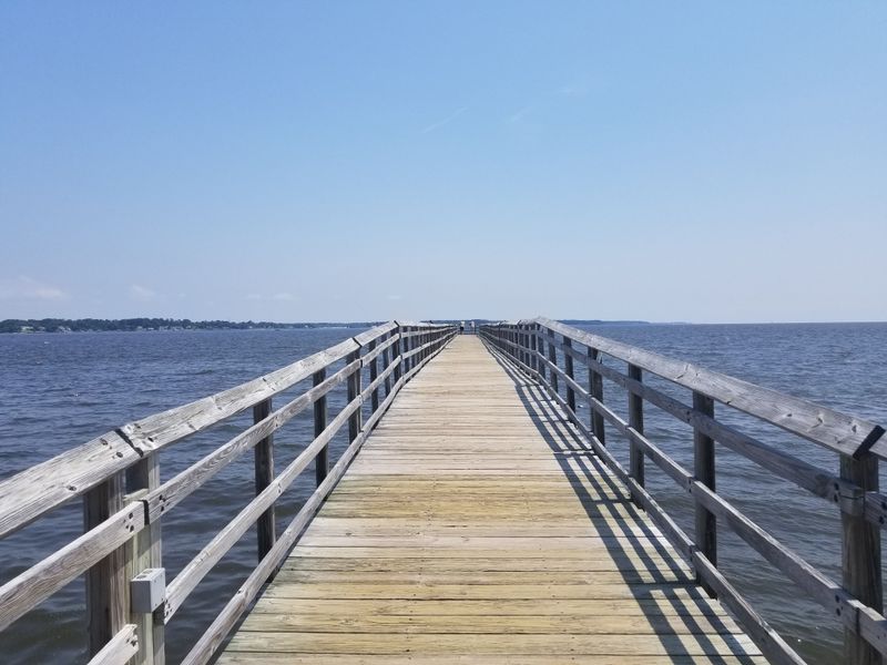 A Riverfront That Reflects Warm Light After Sunset