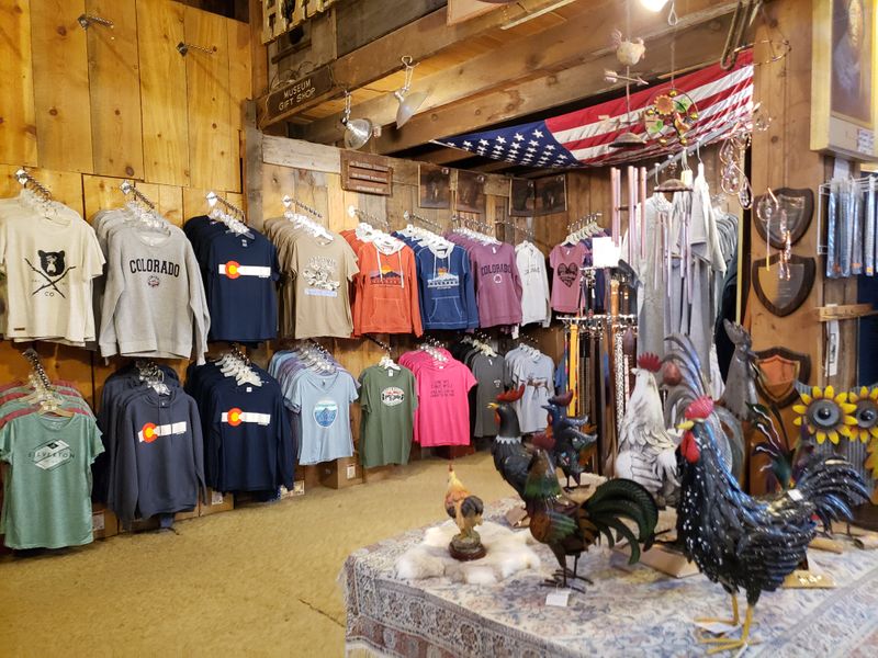 Colorful Storefronts Against White Hillsides