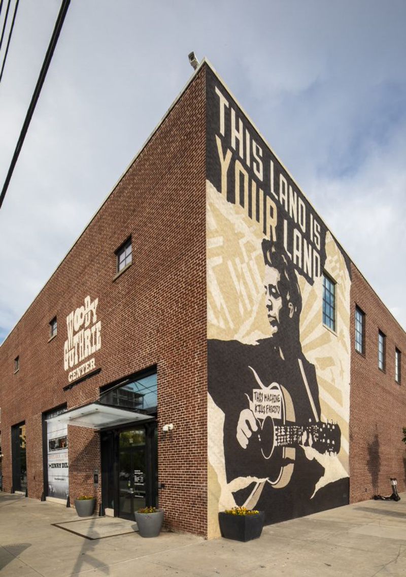 Woody Guthrie Center and Bob Dylan Center, modern archives near Deco neighbors