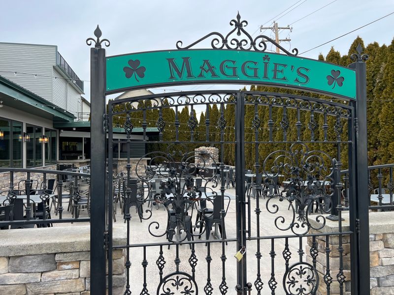 Warm Lights Against A Cloudy River