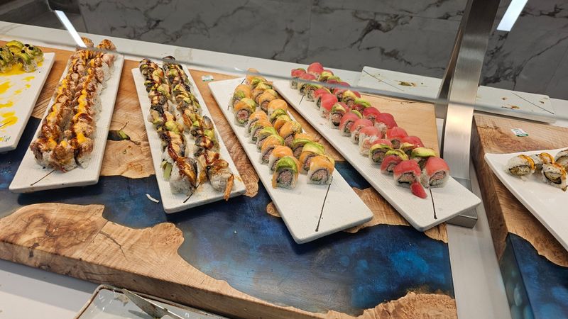 Sushi Bar With Fresh Rolls Made Throughout The Day