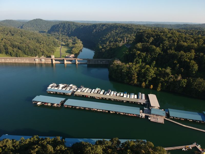 Boaters Floating Over A Lost Town