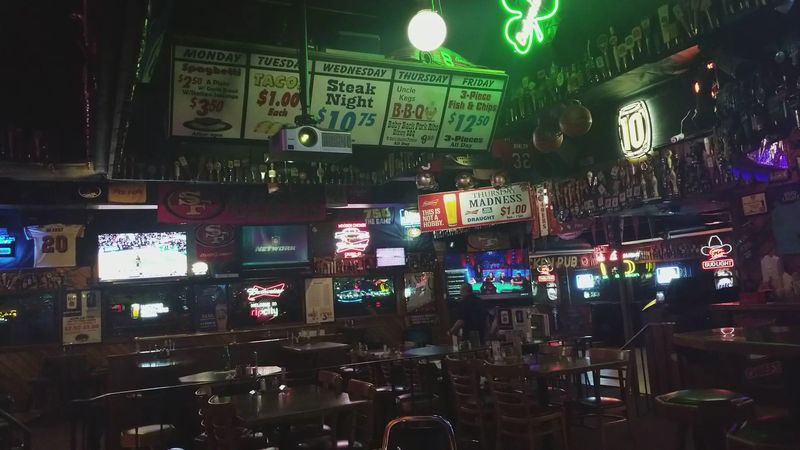 That Darkly Lit, Cozy Dive Bar Atmosphere Everyone Loves