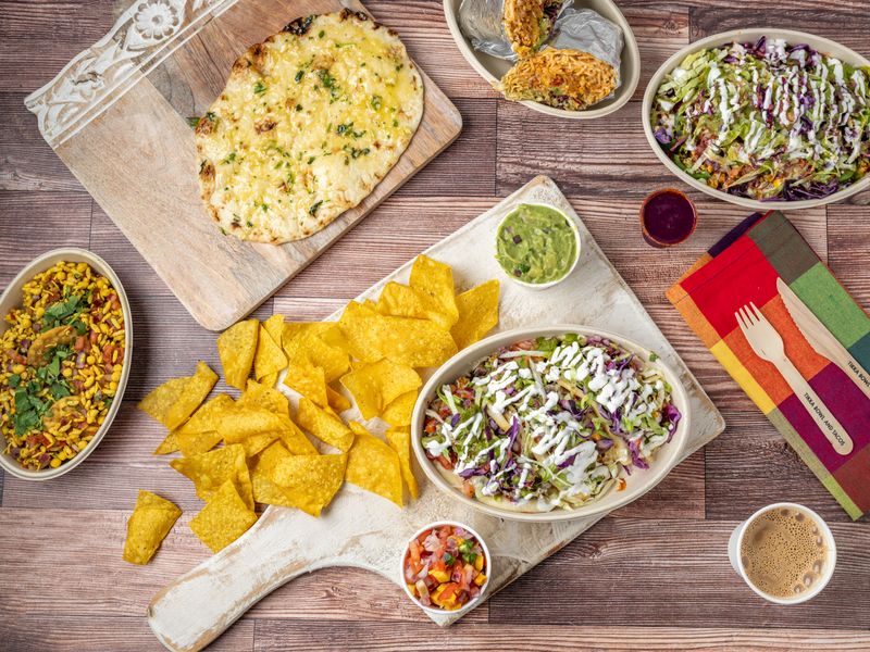 Topped with Seasoned Ground Beef or Beans