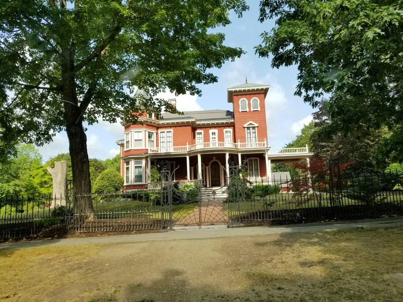 Stephen King's Victorian Mansion With Its Wrought Iron Gate