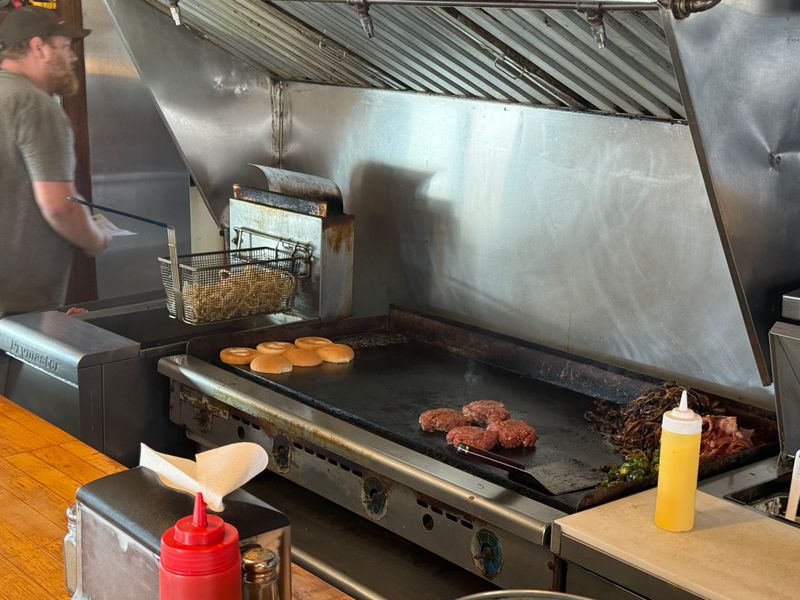 The Burgers Are Cooked Fresh on a Flat-Top Grill Right Before Your Eyes