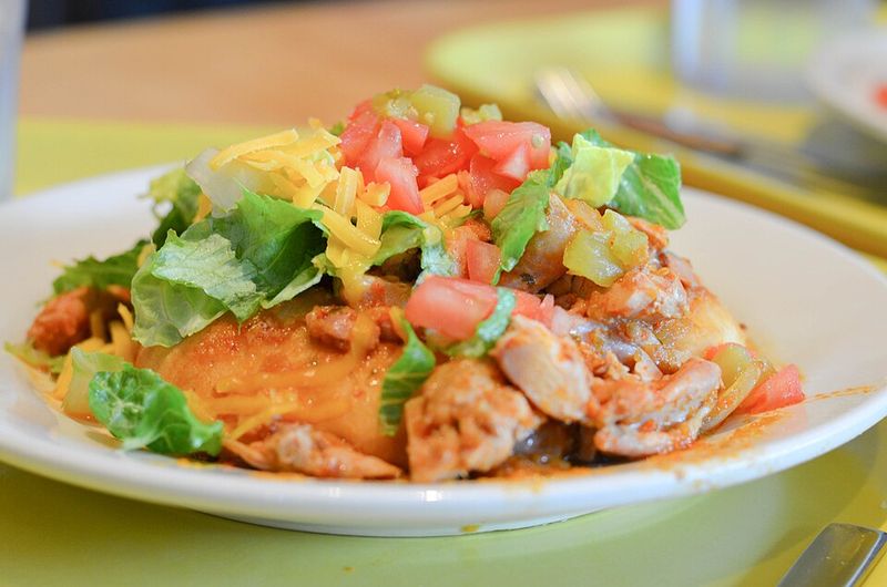 Fresh Lettuce, Tomatoes, and Cheese Complete the Build