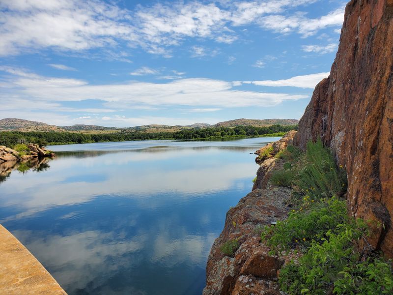 Serene Lakes Reflecting Mountains and Sky