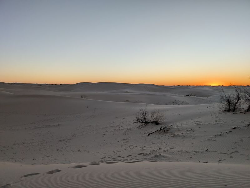 Hiking Across Endless Waves of White Sand