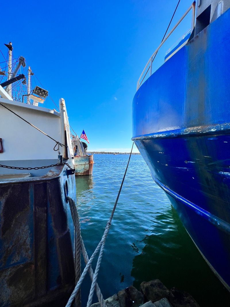 Leaning Over Railings To Film Boats In Tight Spots